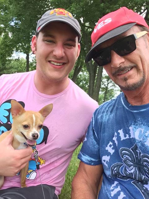 Brandon Friederich with his dad, James, and their dog, Dallas the Chihuahua.