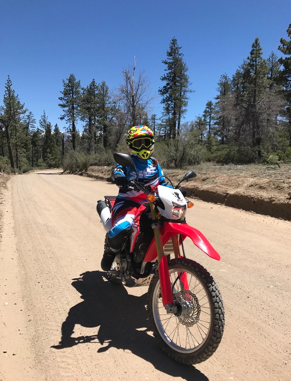 Cinnamon Kernes with her motorcycle.